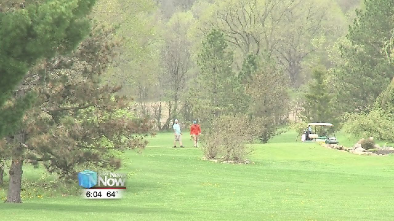Weather holding up golf play 1.jpg